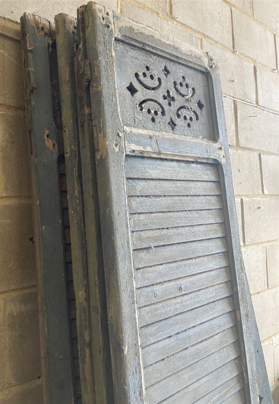 A set of four 19th century French blue painted three panel shutters, 54 x 230cm